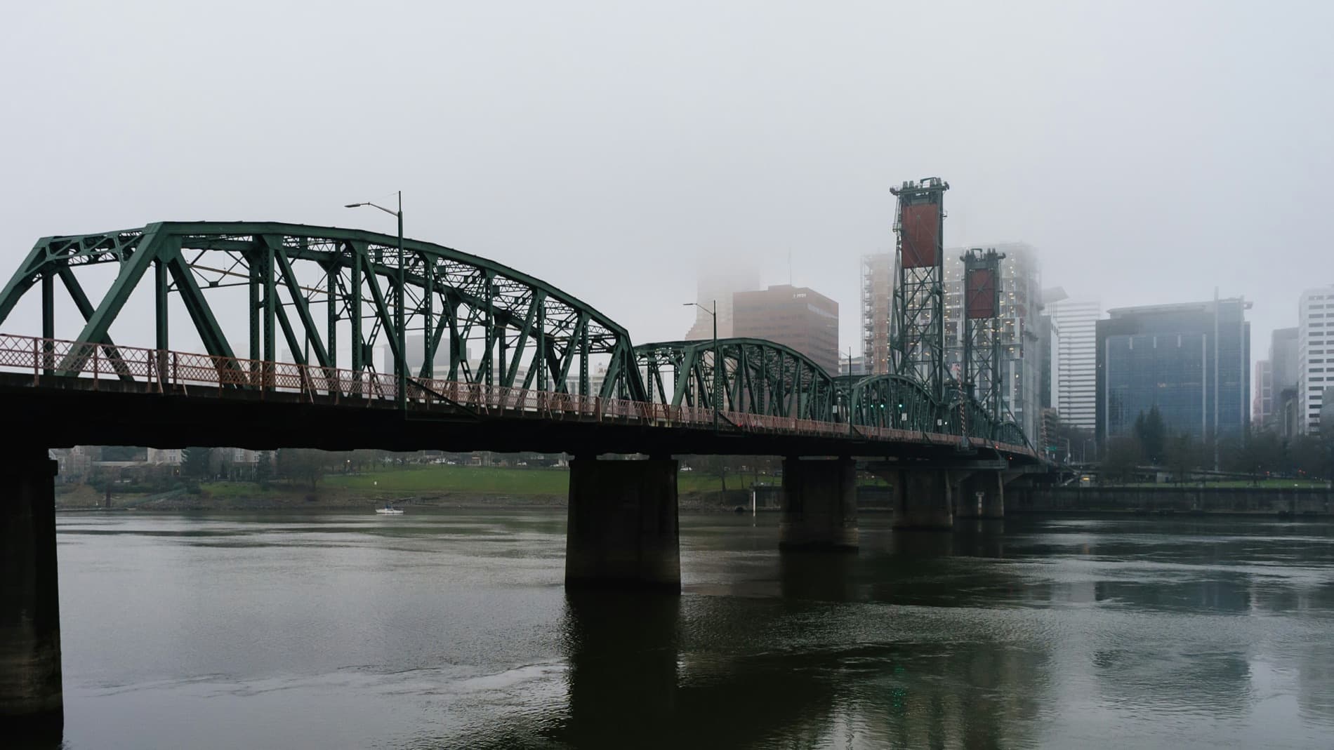 The Hawthorne Bridge in fog over the Willamette