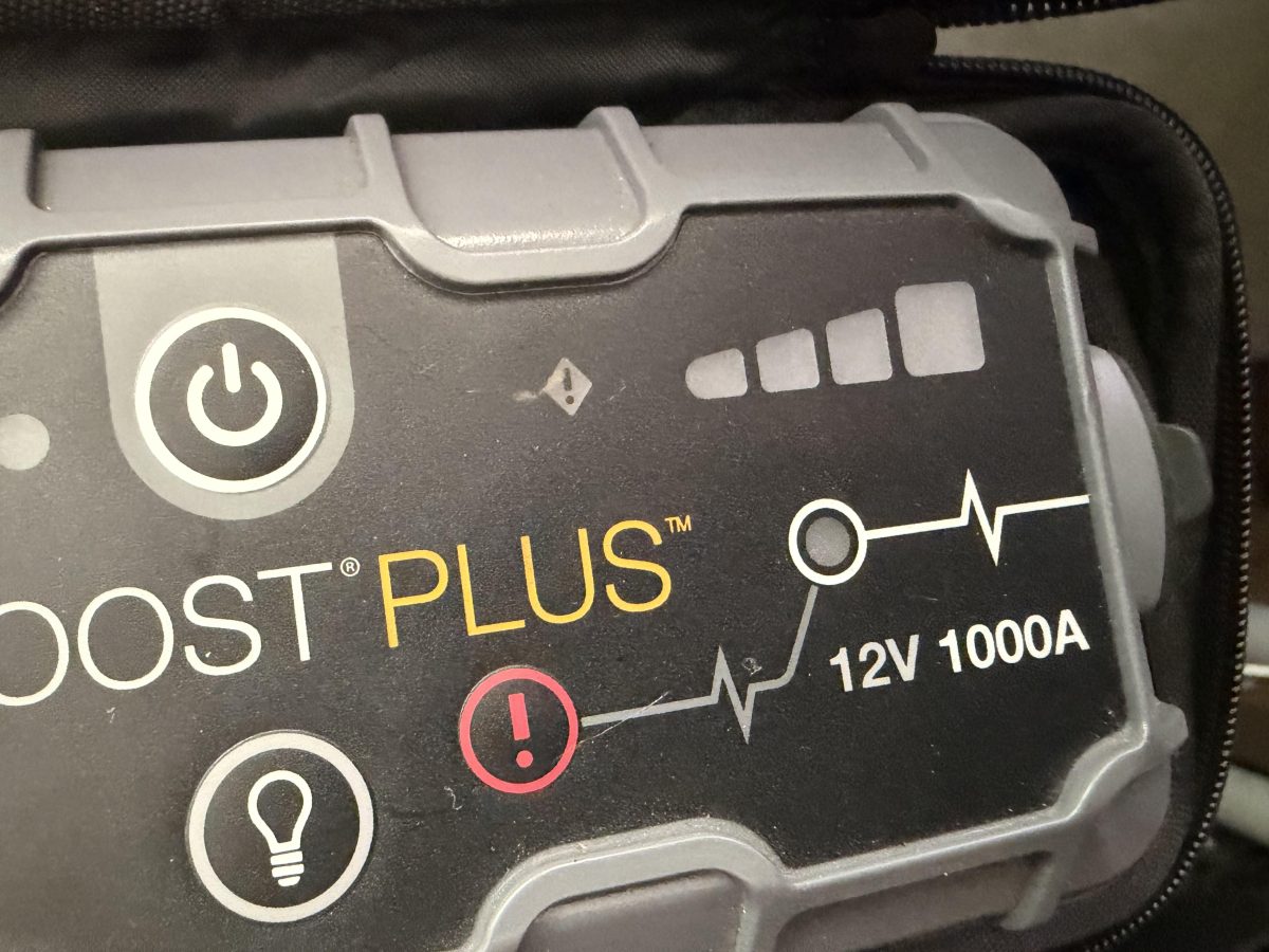 NOCO GB40 control buttons showing the red exclamation-point Manual Override button